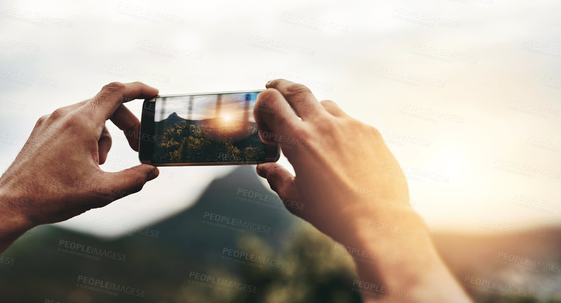 Buy stock photo Sunset, photography and hands of person with phone, screen or post on social media with nature, landscape or sun. Cellphone, photo or man with tech for memory of vacation, holiday or view of mountain