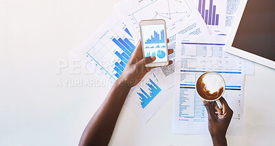 Buy stock photo Phone screen, paperwork and hands of person with charts, graphs and statistics for productivity in office. Data analysis, mobile app and consultant with coffee, documents and smartphone from above