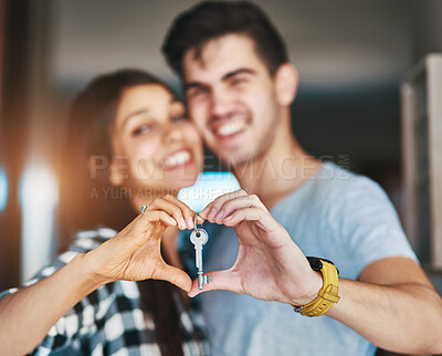 Buy stock photo New home, heart hands and couple with keys for property, moving day and house investment. Homeowner, real estate and happy man and woman with portrait for mortgage, purchase and rental in apartment