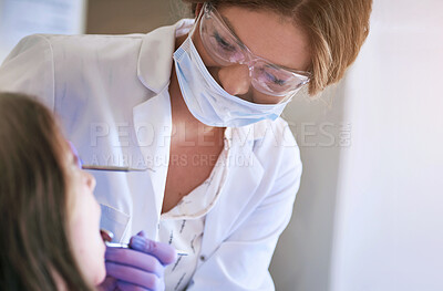 Buy stock photo Child, woman dentist and dental checking with oral hygiene and teeth care with patient and mouth exam. Toothache, tooth cleaning and medical help with kid doctor and dentistry tool for healthcare