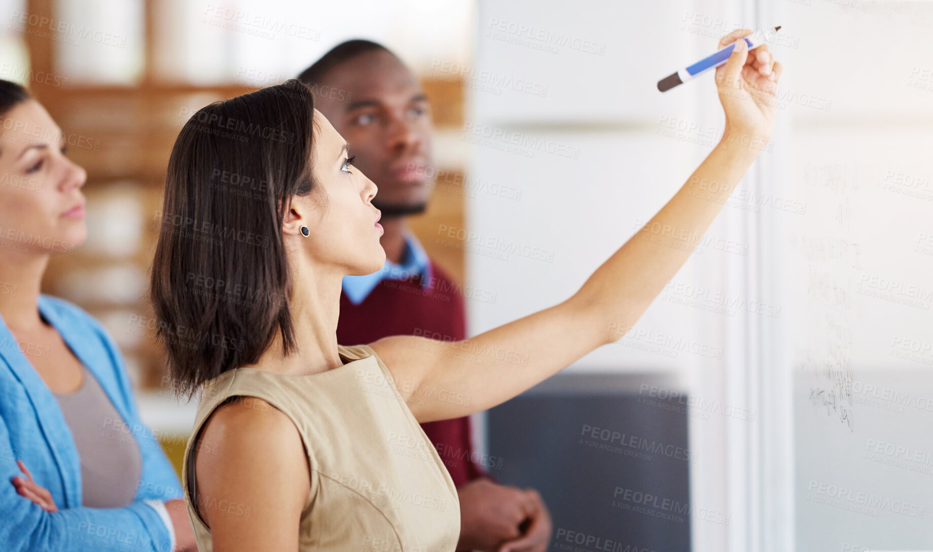 Buy stock photo Writing, business people and problem solving in office for brainstorming, ideas or planning in meeting. Creative employees, diversity and teamwork on glass board for strategy, solution or schedule