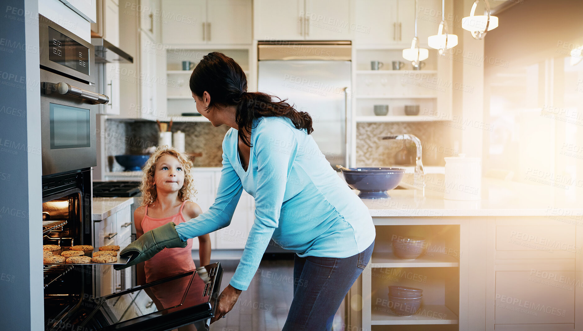 Buy stock photo Mother, daughter and cookies in oven for baking in kitchen with learning, bonding and fun in home with sunlight. Family, woman and girl with cooking dessert, cake and sweet snack by stove in house