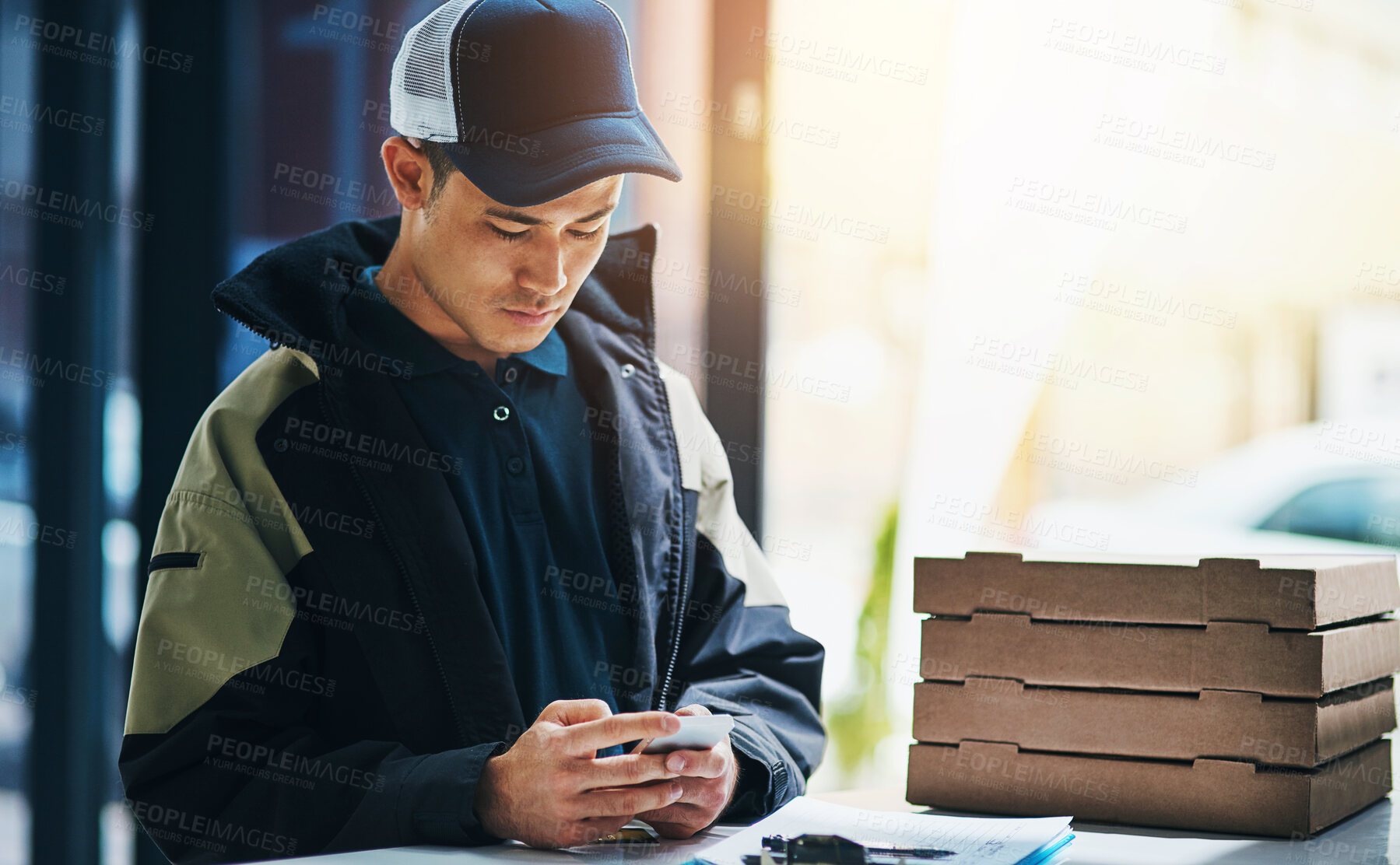 Buy stock photo Office, delivery and man with pizza and phone for distribution, online order and courier service in city. Building, ecommerce and person with boxes for staff lunch, dinner and supper on smartphone