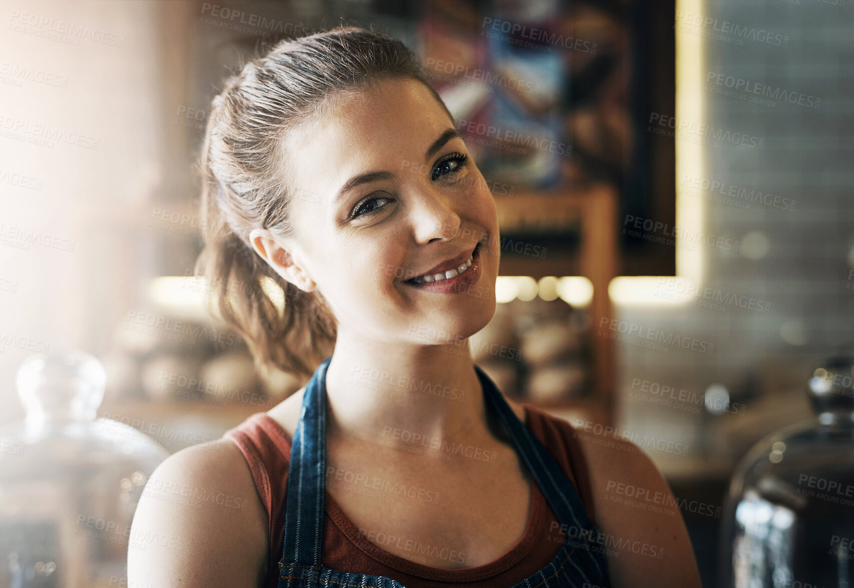 Buy stock photo Happy, waitress and portrait of woman in coffee shop for service, welcome and barista job. Hospitality, small business and confident person in cafeteria or restaurant for serving, startup and menu