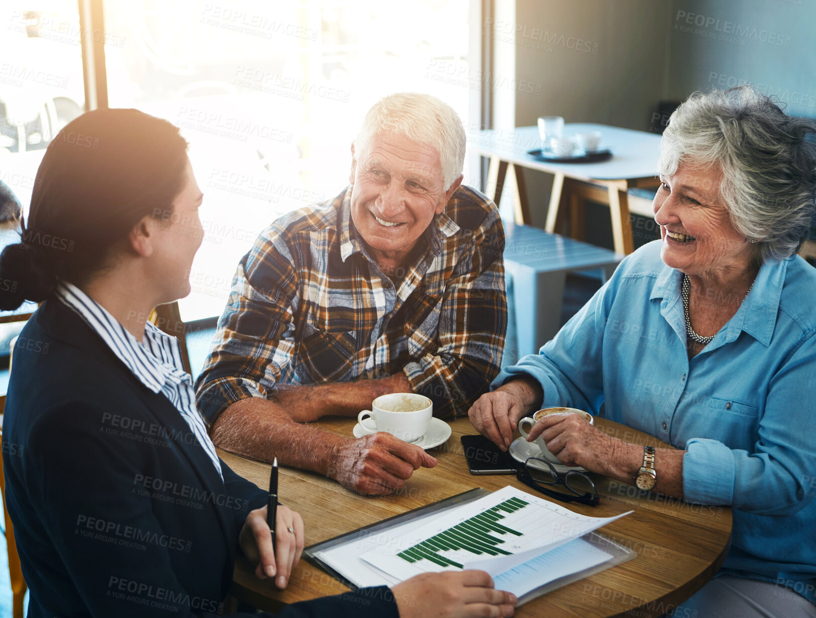 Buy stock photo Senior, couple and financial advisor talking with paperwork, cafe and meeting for investment conversation. Statistics, graphs and finance with people, retirement plan and planning with professional