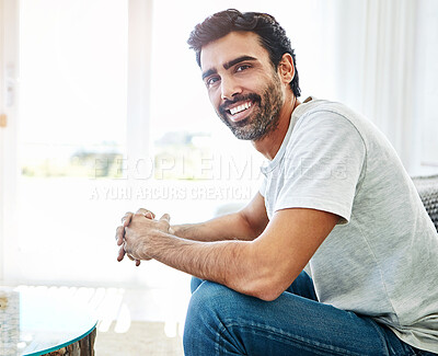 Buy stock photo Indian man, portrait and happy or relax in home with confidence, comfortable and weekend break. Person, smile and pride in living room of house for me time, rest and peaceful leisure in apartment