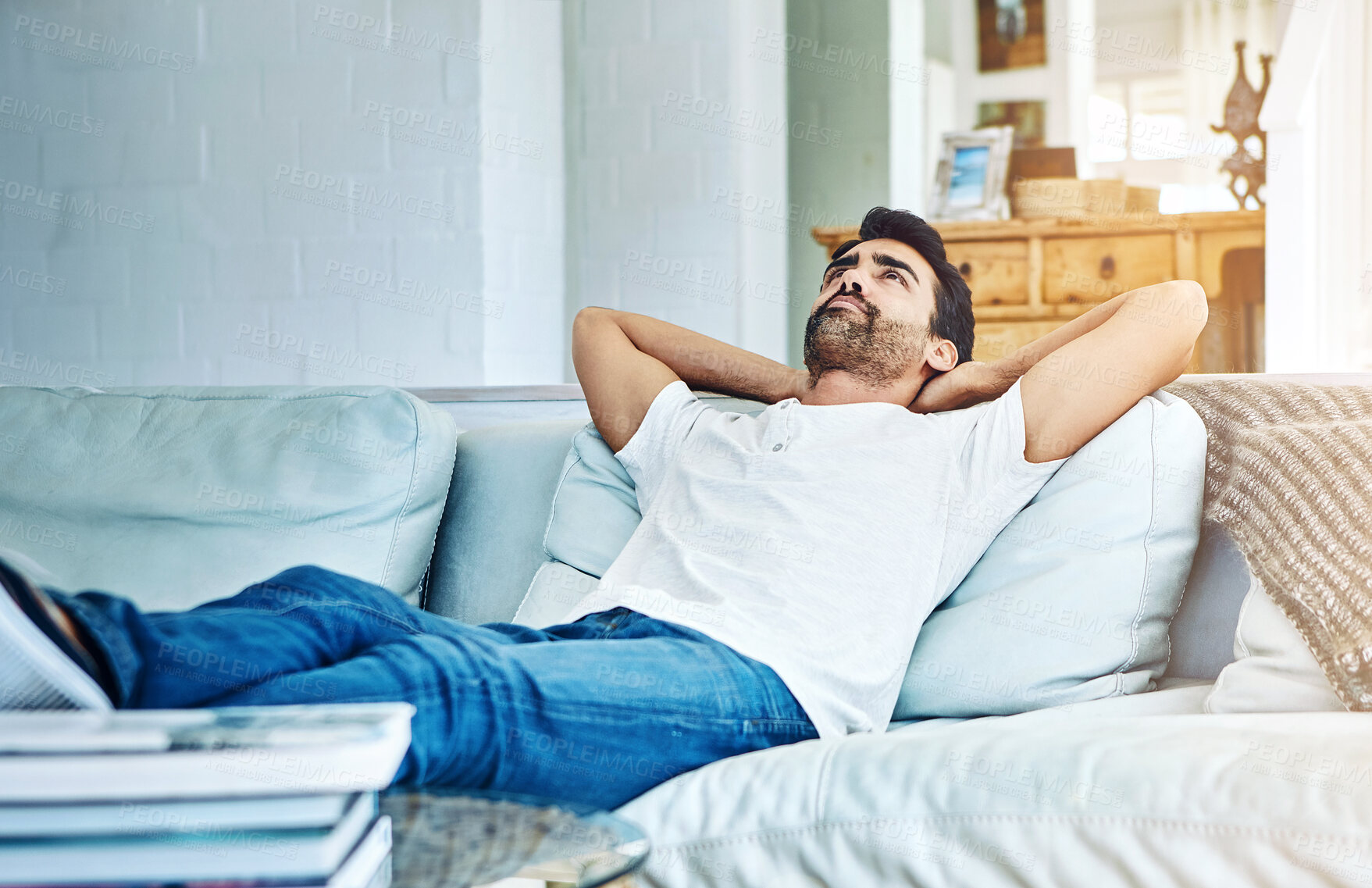 Buy stock photo Man, relax and lying on sofa for satisfaction, peaceful and weekend break in living room. Lazy, calm and male person with arms out on couch for happiness, comfortable rest or chill day off in home