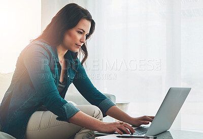 Buy stock photo Woman, laptop and remote work in home, freelancer and checking email for job in living room on sofa. Blog, online research and social media for networking, typing and comfort in apartment lounge