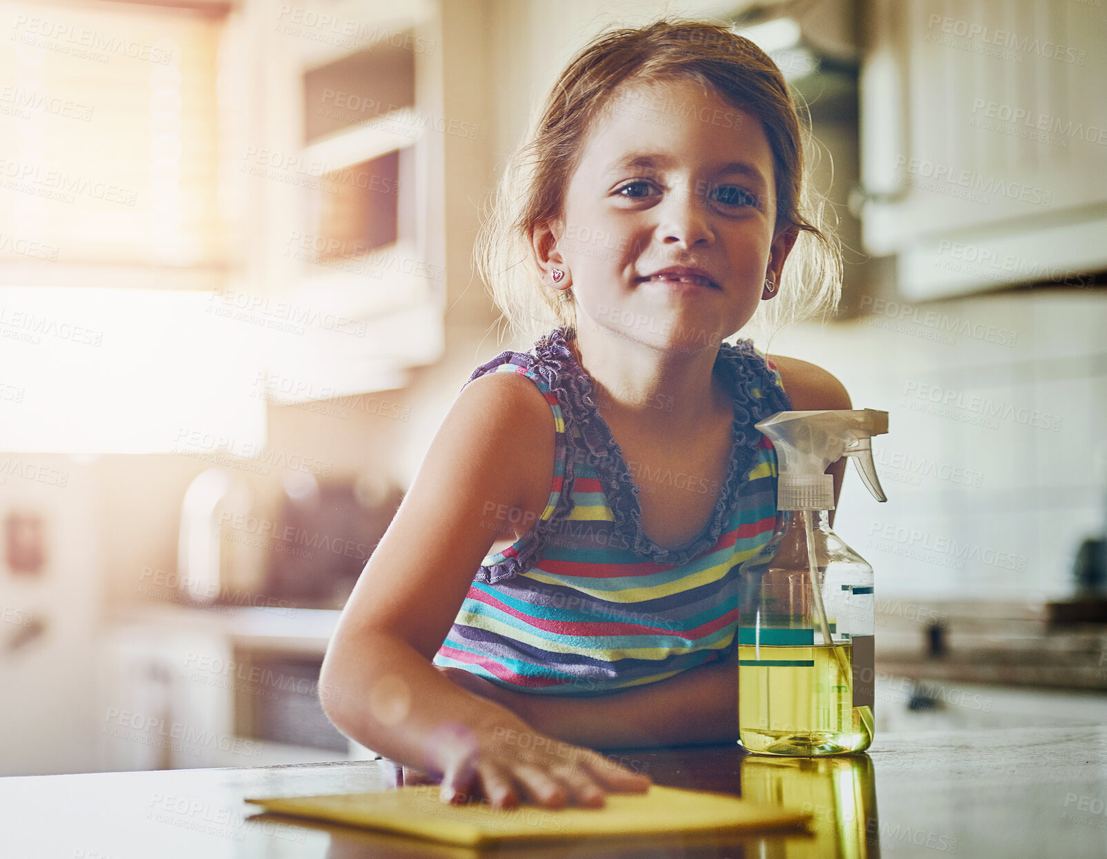 Buy stock photo Girl, child and portrait with cleaning the table in kitchen with housework responsibility and helping hand for dust. Person, detergent and cloth for surface disinfection, bacteria or learning hygiene