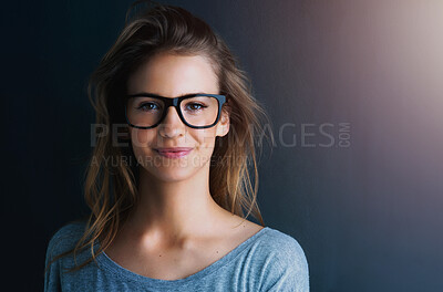 Buy stock photo Studio, teenager or portrait of a girl for fashion, glasses or optometry with vision isolated on dark background. Style, happy or face of woman, mockup space or confident model with eyewear or smile