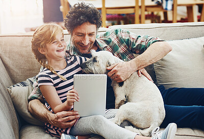 Buy stock photo Happy, tablet and father with child and dog in home for watching movies, cartoons and online entertainment. Family, love and dad with girl on digital tech for internet, videos and relax on weekend