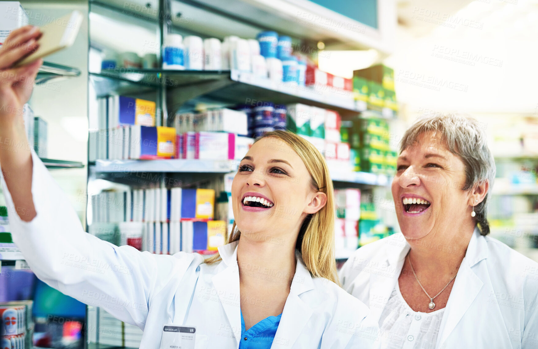 Buy stock photo Pharmacy, people and happy selfie in store with team in healthcare with sale of drugs or medicine. Women, smile and photography of pharmacist, staff or post on social media with friends at work