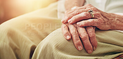 Buy stock photo Closeup, morning and hands of senior woman in retirement home for thinking, reflection and nostalgia in house. Old age, living room and elderly person with ring for relaxing, calm and widow on sofa