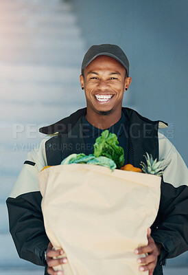 Buy stock photo Smile, portrait and delivery man at door with groceries for online shopping bag, home distribution and transport service. Supermarket, food package and happy courier with fresh vegetables at house.