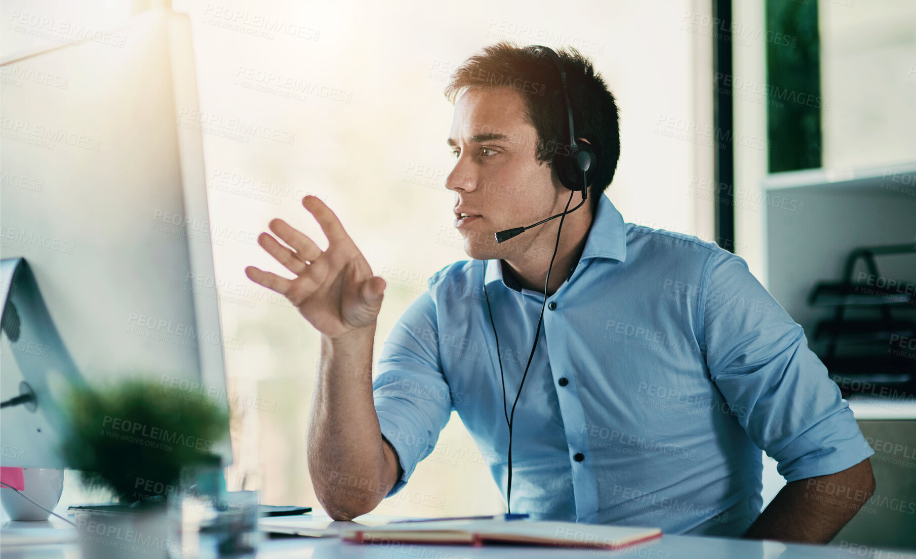 Buy stock photo Customer service, phone call and man with headset, computer and consulting at help desk. Lead generation, conversation and advice at callcenter for telemarketing, sales and online account support.