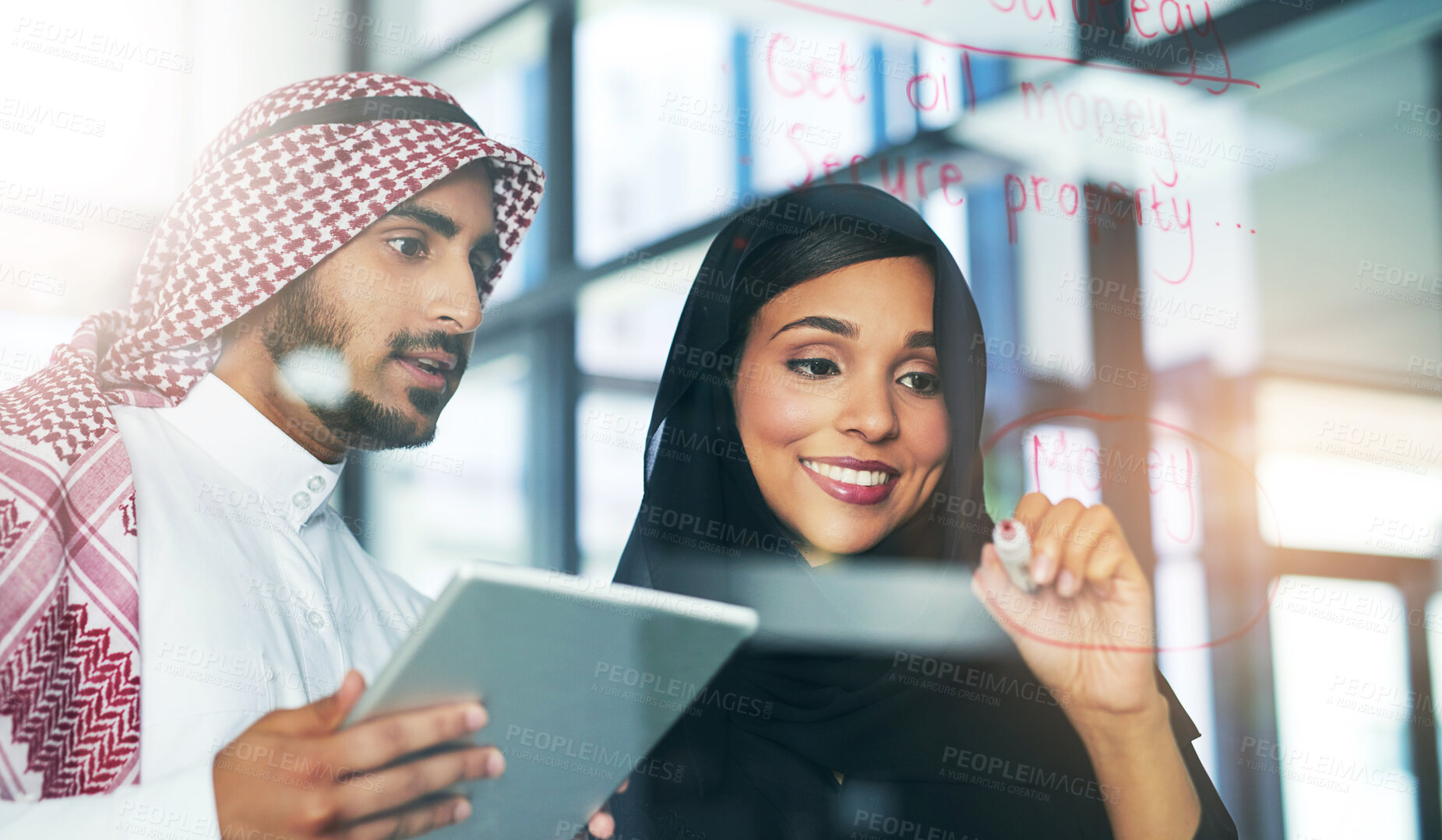 Buy stock photo Glass wall, planning and coworkers for brainstorm, strategy and ideas or vision for oil investment. Finance, Islamic and tablet for meeting and man with female person, colleagues and profit project