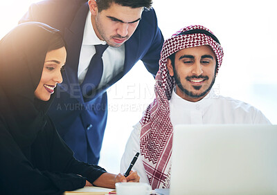 Buy stock photo Muslim, employee and laptop in office for teamwork, discussion and partnership for b2b collaboration. Diversity, hijab woman and man coworker for online project, professional communication in Dubai