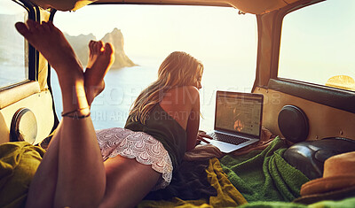 Buy stock photo Car, travel and woman with laptop for relax, sunset and remote worker for road trip. Transport, technology and internet for email or online work in boot, female person or calm for ocean side vacation