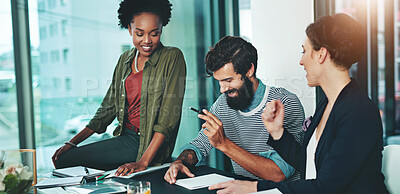 Buy stock photo Business people, meeting and teamwork with paperwork for employee training and brainstorming in office. Designer group, communication and collaboration with documents for intern feedback and support