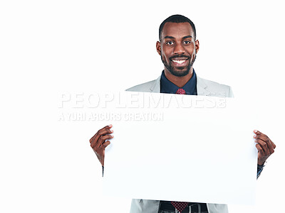 Buy stock photo Business, man and happy with poster in studio for promotion with mockup space for advertising or marketing. Portrait, sign board and presentation with instructions, information and promotion or deal