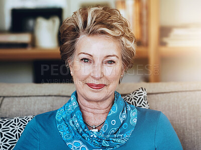 Buy stock photo Mature, woman and portrait for relax on sofa at house with smile, relaxing and peace in calm living room. Confident, grandmother and couch in lounge with care, retirement and wellness with wrinkles