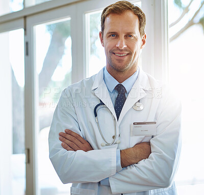 Buy stock photo Man, happy and portrait in hospital with doctor of bone for spinal disorders, ligament tears and arthritis treatment for people. Male medical employee, orthopedic and confident in career of medicine.