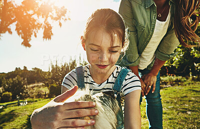 Buy stock photo Happy, girl and mother playing with dog at park for rest, relax and fun outdoor on summer holiday. Smile, kid and face with pet companion or puppy for love, harmony and stress relief with lens flare