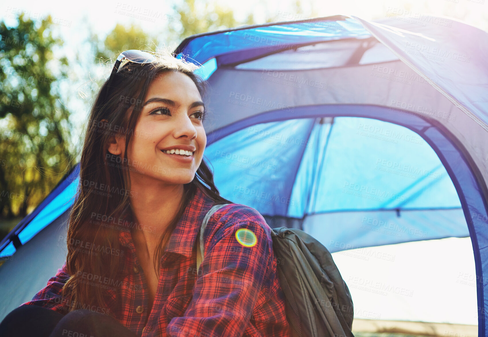 Buy stock photo Woman, smile and alone camping by tent in nature for adventure, freedom and vacation or peace. Camper, happy and relax in woods or forest in morning for summer holiday, memory and outdoor experience