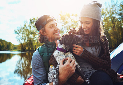 Buy stock photo Couple, camping and lake in nature with dog for freedom, adventure travel with sustainability. Man, woman and pet in countryside by water for relax on vacation, happiness for holiday environment