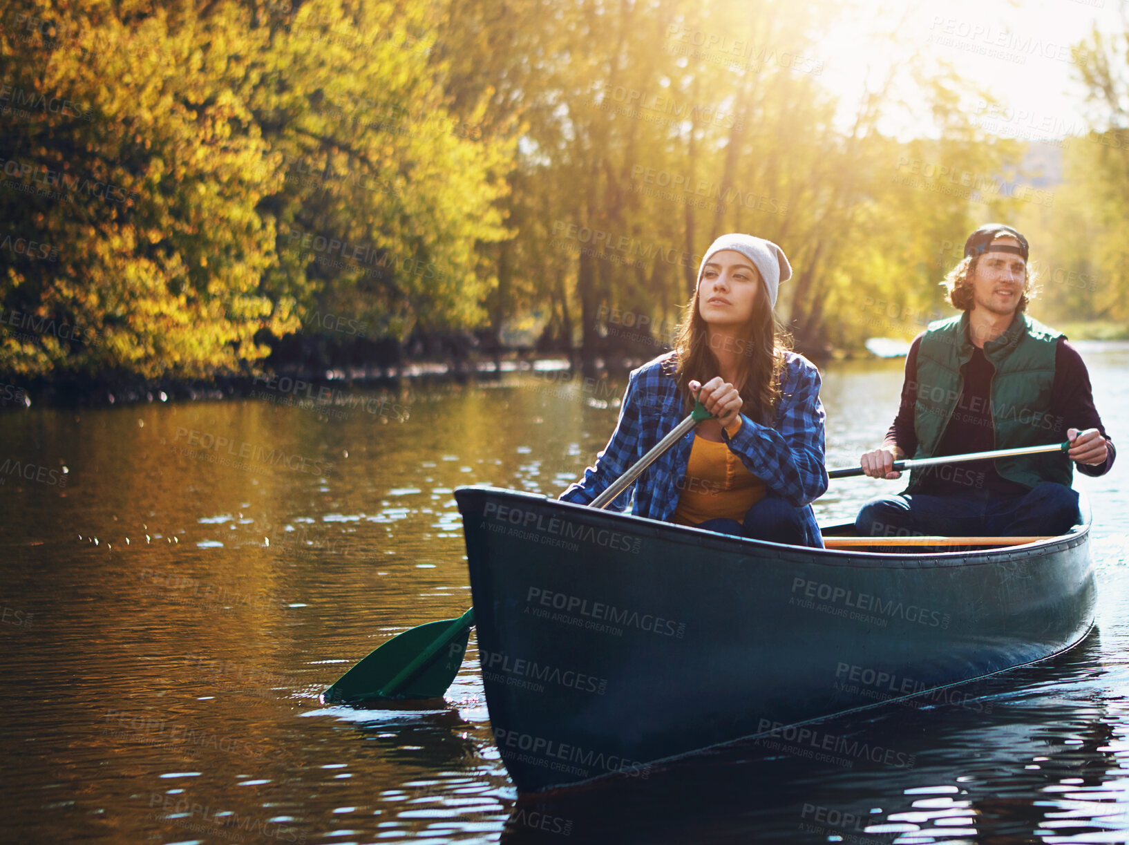 Buy stock photo Lake, canoe and couple with nature, water and happiness with love, vacation and bonding together. Canada, river or man with woman, environment or holiday with weekend break, relationship or peace