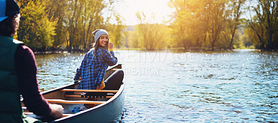 Buy stock photo Couple, canoe and lake for nature holiday exploring or rowing outdoor, environment or journey. Man, woman and happy or travel weekend or river morning at vacation resort in Colorado, calm or forest