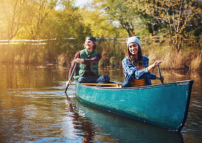 Buy stock photo Lake, canoe and couple with nature, vacation and happiness with love, romance and bonding together. Water, river or man with woman, environment or holiday with weekend break, relationship or activity