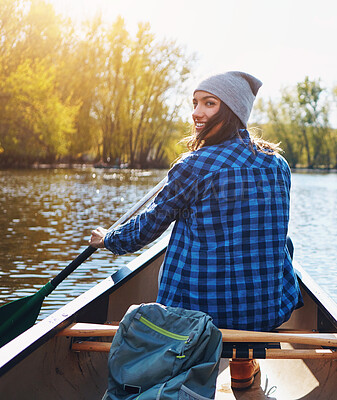 Buy stock photo Back, nature and smile of woman in kayak on lake for adventure, holiday or summer vacation. Boat, happy and relax with person rowing on river or water for discovery, experience or exploration