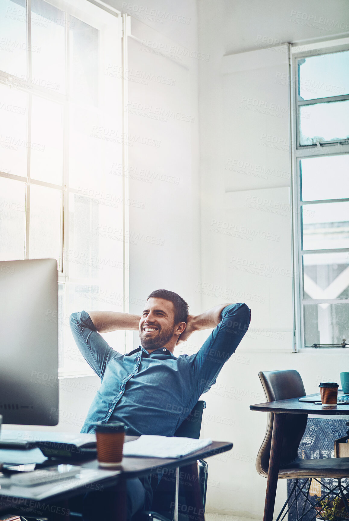 Buy stock photo Businessman, relax and stretching at office desk for happiness, productivity or done with project. Break, computer and male employee with arms behind head for satisfied, confident or achievement