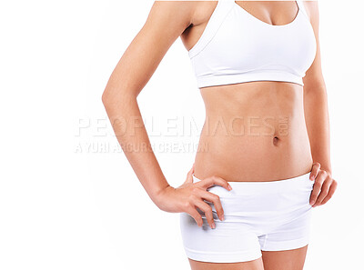 Buy stock photo Closeup, body and woman in underwear, fitness and wellness isolated on white studio background. Healthy person, model and girl with balance, belly and mockup space with exercise, stomach or nutrition