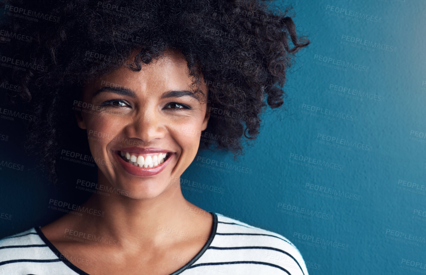 Buy stock photo Happy, laugh and portrait for African woman, studio and confidence for smile and joy. Excited, pride and face with isolated person for cheerful, joy and positive fun attitude on blue background