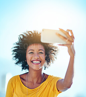 Buy stock photo Blue sky, woman and smile with selfie in sunshine for summer, update or post on social media. Relax, memory and female person with digital photography for online blog, network or happiness on weekend