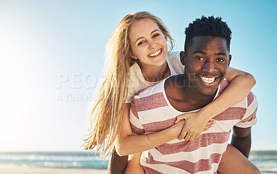 Buy stock photo Portrait, piggy back and beach with couple, love and sunshine with happiness, interracial and romance. Face, seaside and man carrying woman with vacation, adventure and summer with honeymoon or smile