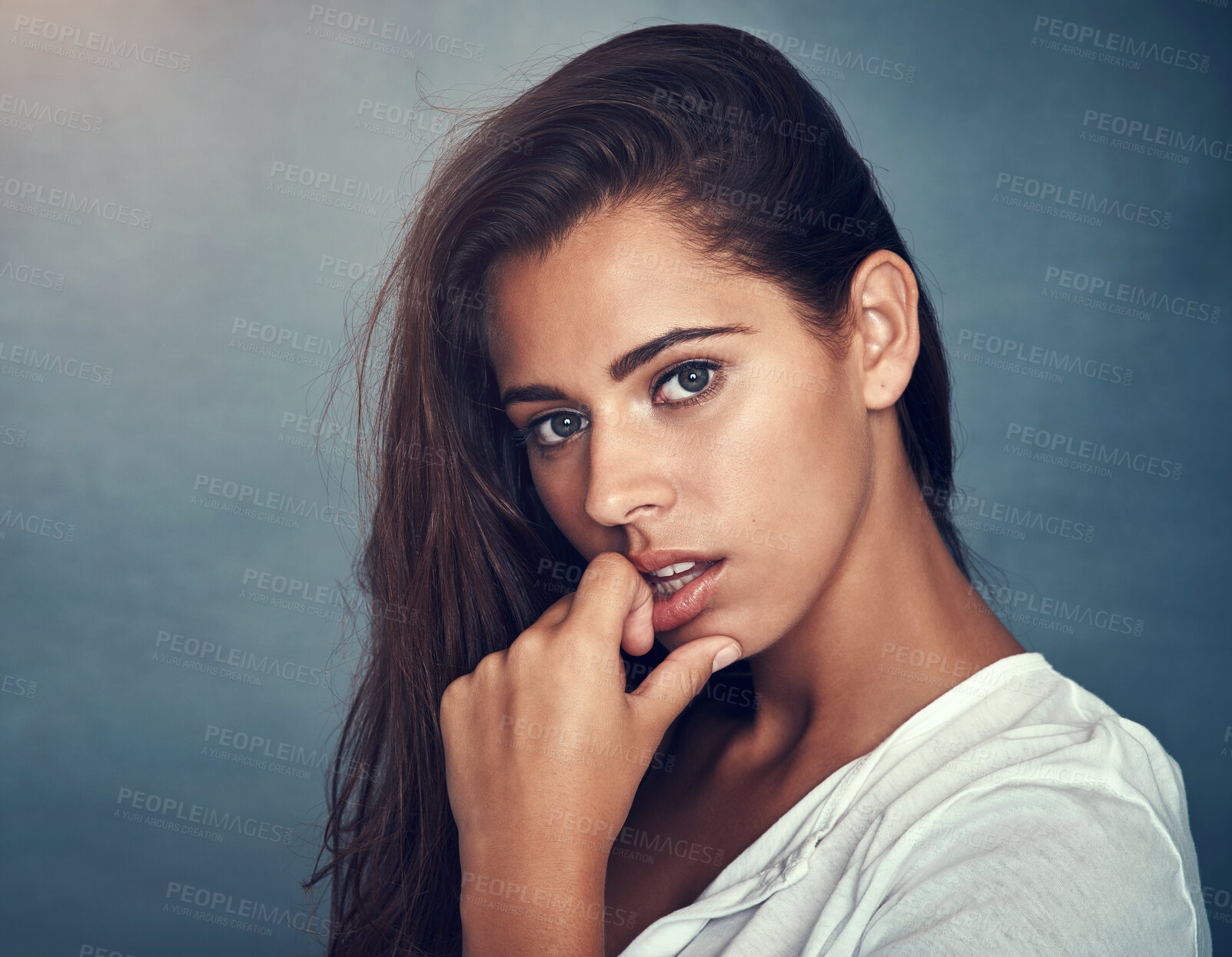 Buy stock photo Woman, portrait and proud for haircare, studio or backdrop for treatment, keratin and confident. Girl, beauty or hair for cosmetics, healthy or haircut and shampoo shine for growth on blue background