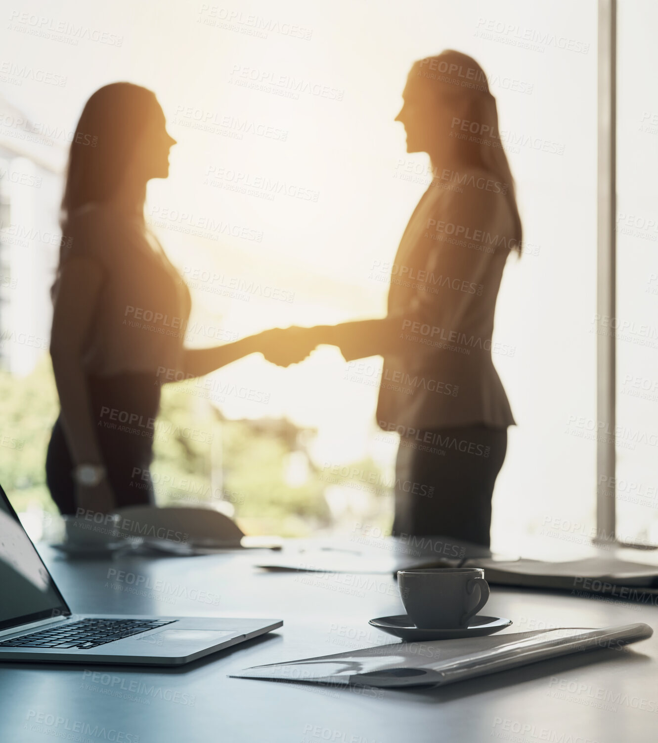 Buy stock photo Business women, handshake and collaboration in office together for partnership, collaboration or deal. Teamwork, welcome and female people with laptop and coffee for b2b, meeting or onboarding
