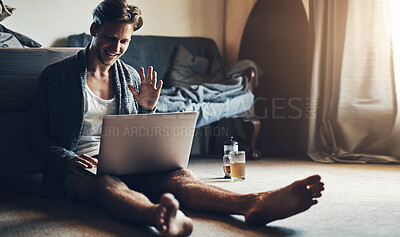 Buy stock photo Video call, wave and man on laptop in home for conversation, online chat and hello for greeting. Communication, social networking and person on computer for discussion, talking and speaking on floor