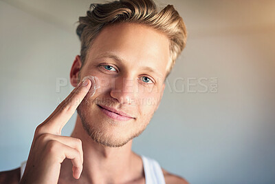 Buy stock photo Face cream, skincare and portrait of man with beauty, natural and facial treatment at home. Smile, cosmetic and male person with dermatology sunscreen, lotion or spf for face routine in morning.