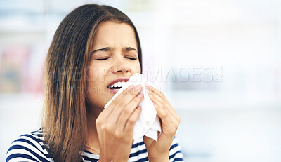 Buy stock photo Sneeze, woman and sick with toilet paper in flu season, allergies or infection in home. Female student, anticipation or nose cloth for virus in living room, FLIRT COVID with mucus congestion or fever