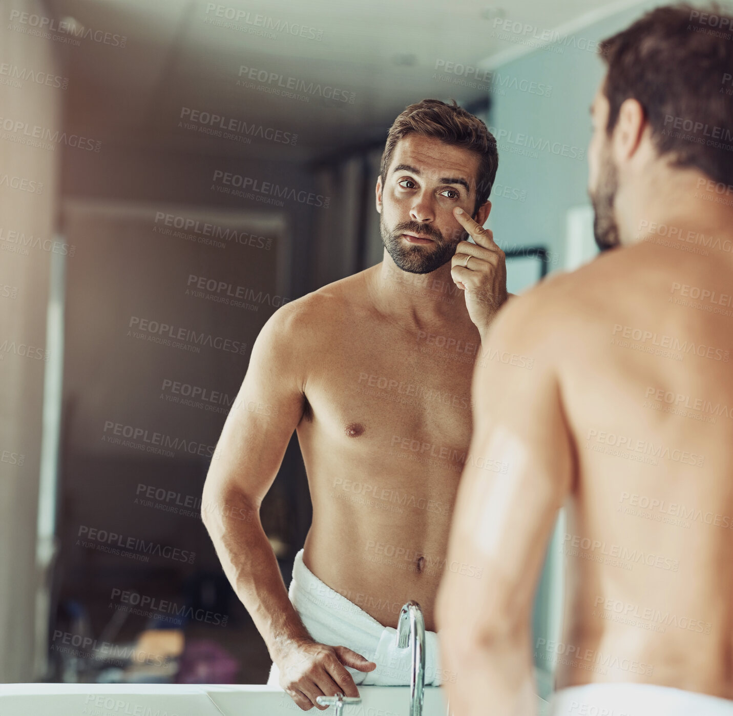 Buy stock photo Beauty, face and skincare with man looking in bathroom mirror during morning routine at home. Skin, health and reflection for guy, grooming and wellness for natural care and wrinkle treatment results