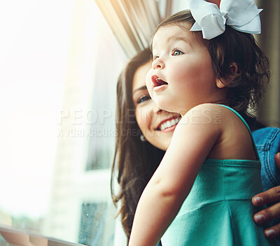 Buy stock photo Mother, child and happy family by window for bonding, playing and visual learning at home. Wow, amazing and surprised daughter, girl or kid with mom or woman for light, summer and excited with smile