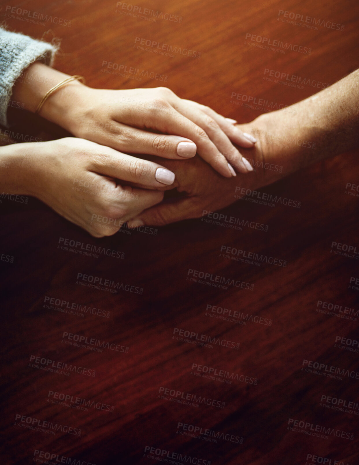 Buy stock photo Support, care and trust with hands of people at table together for hope, empathy and love. Depression, anxiety and pain with couple in home with solidarity for help, from above and mental health