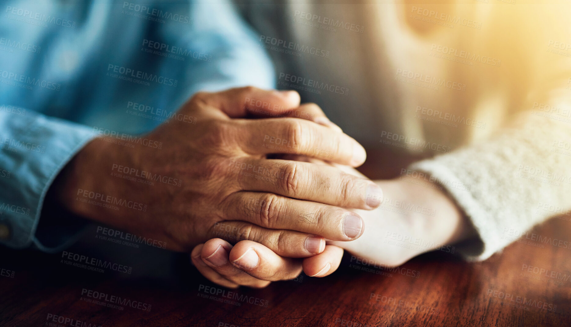 Buy stock photo Love, support and trust with hands of people at wooden table together for comfort, emotion or empathy. Anxiety, depression or mental health with friends praying in solidarity for grief, loss or pain