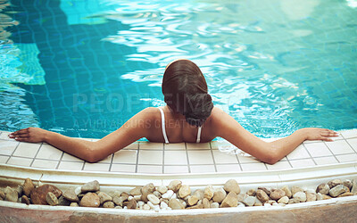 Buy stock photo Woman, spa and relax by swimming pool for holiday, calm and rest for vacation at resort for salon treatment. Zen, water and female person for peace in hotel, Thailand or luxury for wellness and detox