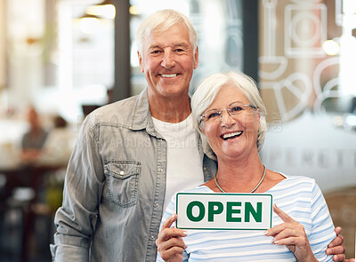 Buy stock photo Senior couple, business and open sign portrait with happy smile from hospitality and coffee shop opening. Working, service and proud elderly people with entrepreneur and cafe owner at restaurant