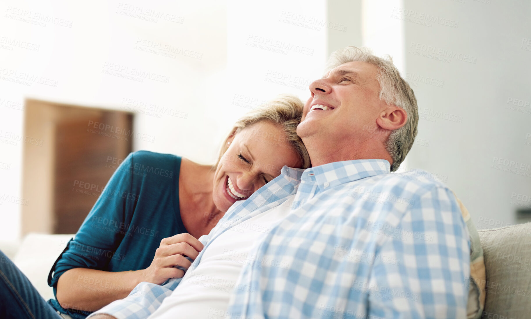 Buy stock photo Mature, man and woman with laugh for relax on sofa, discussion with comedy in home. Happy couple, together and couch with happiness for bonding, cheerful conversation with funny joke in living room